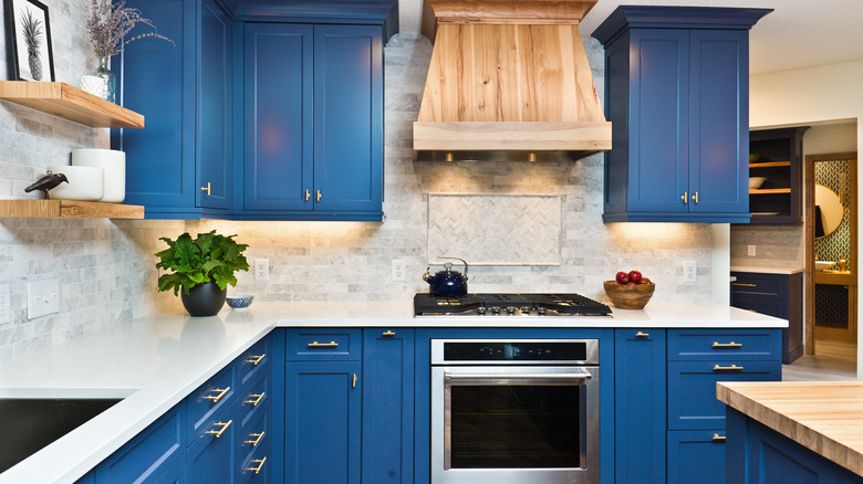 Dark blue kitchen cabinets