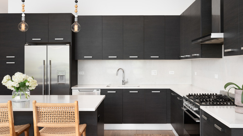 Kitchen with black cabinets