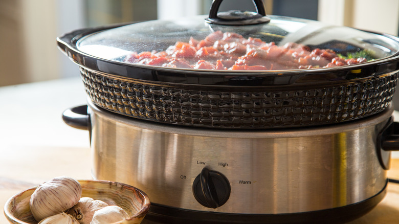 slow cooker making a meal