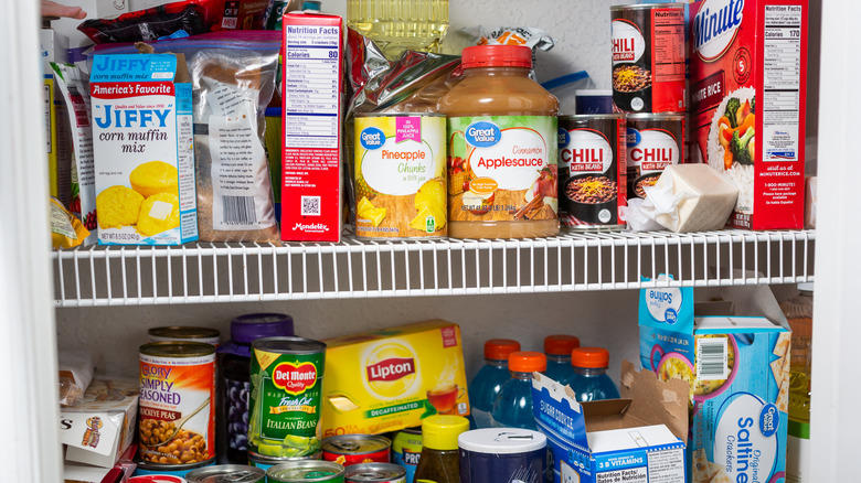 Disorganized pantry shelves