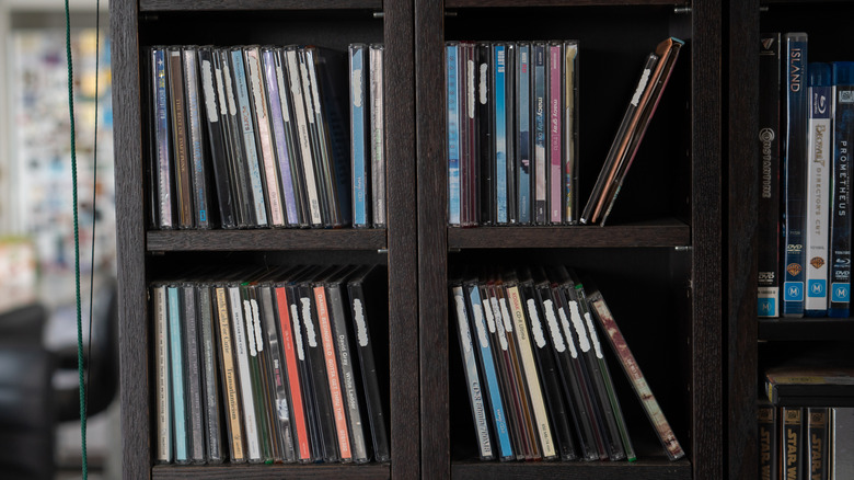 Closeup of CDs in a CD rack