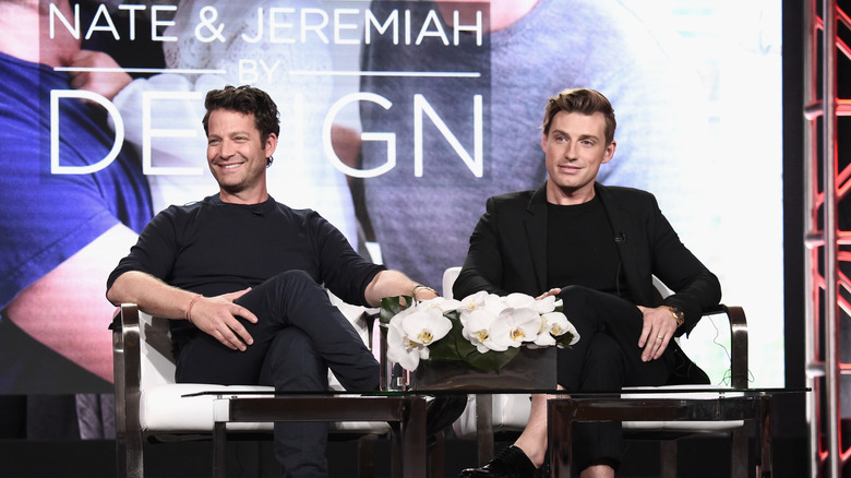 HGTV's Nate Berkus and Jeremiah Brent seated in front of a screen