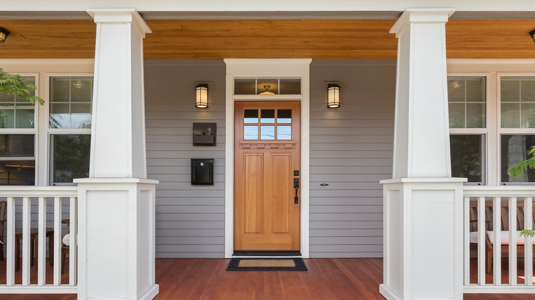 Home exterior with wood front door