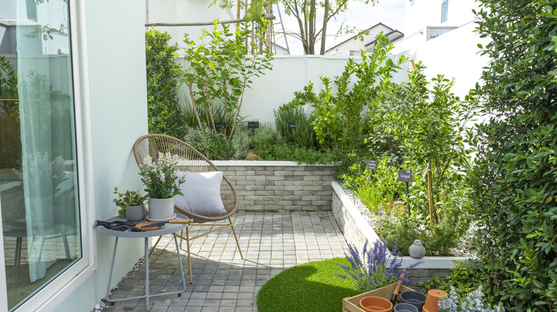 A modern home with a small backyard.