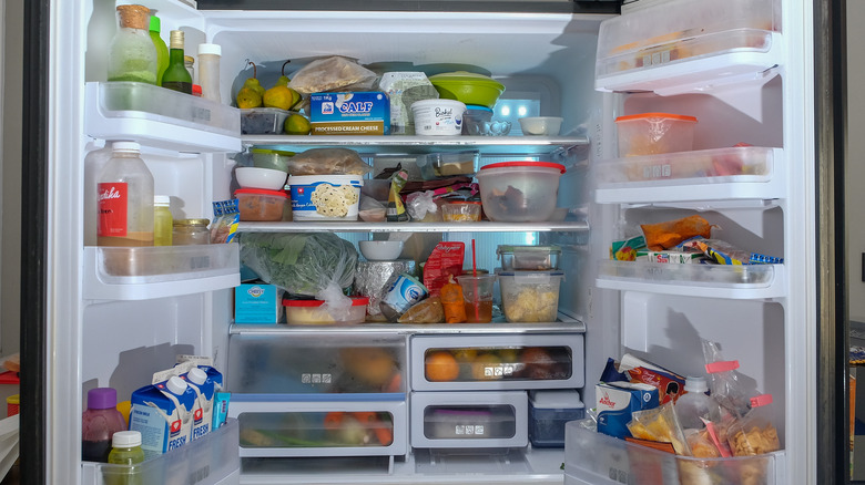 Full and unorganized refrigerator