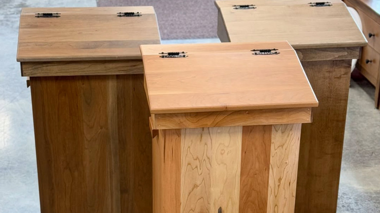 three wooden trash can covers with hinges