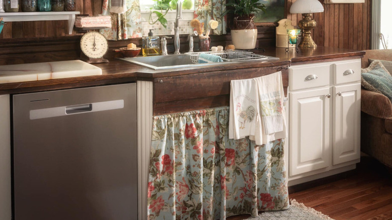 floral curtain under sink in a farmhouse kitchen