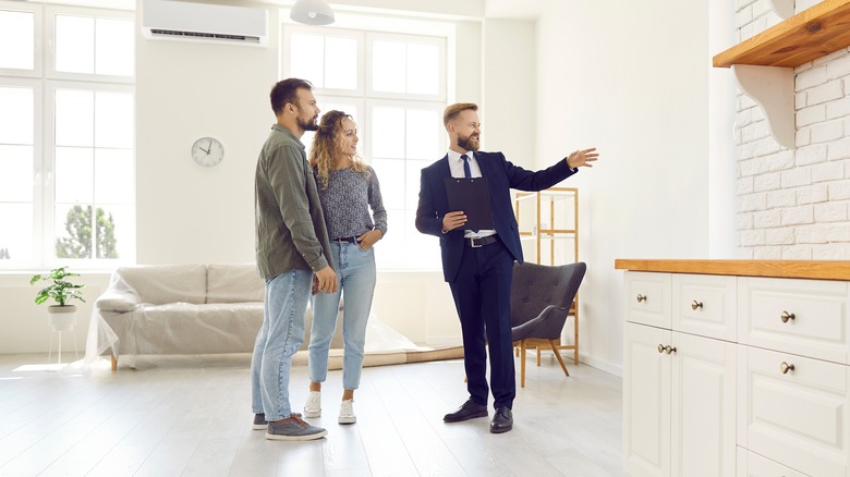 Realtor showing couple a home