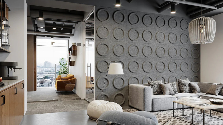 A 3D felt panel accent wall in grey living room