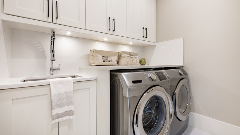white cabinets in laundry room