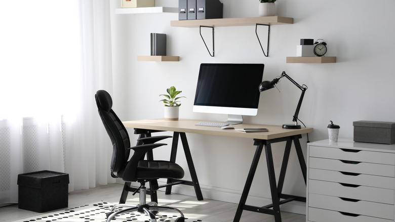 shelves above desk in office