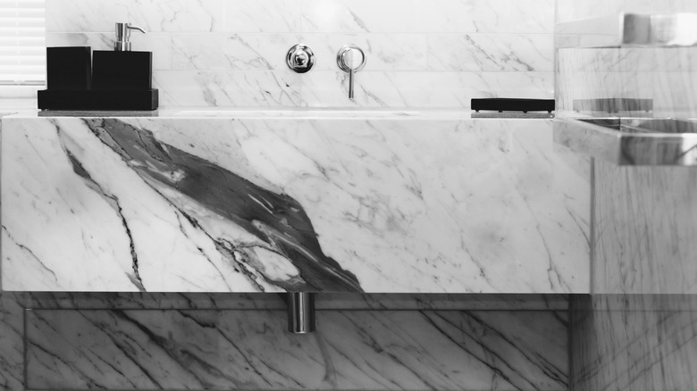 Sink area with black-veined marble