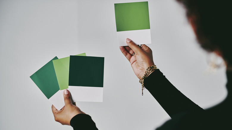 woman looking at paint samples
