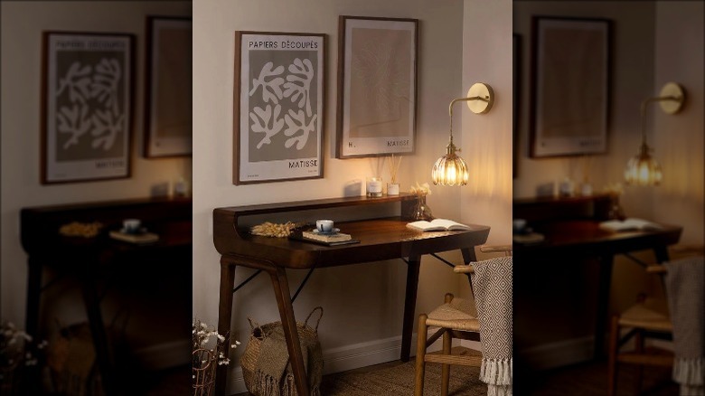 tulip sconce hanging over desk
