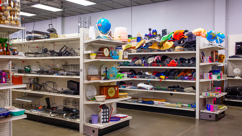 shelves of household items in a thrift store