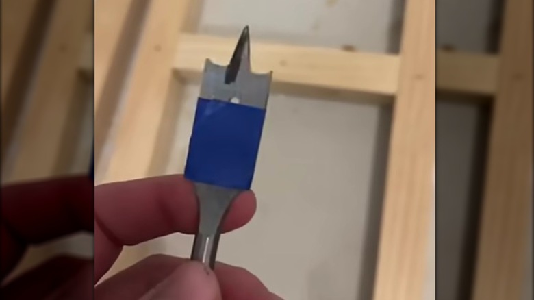 Painter's tape wrapped around a drill bit acts as a depth gauge