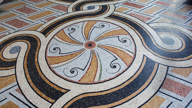 Greek-inspired mosaic pattern with complex, twisting patterns