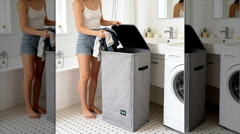 Woman putting dirty laundry in the WTREE hamper from Amazon.