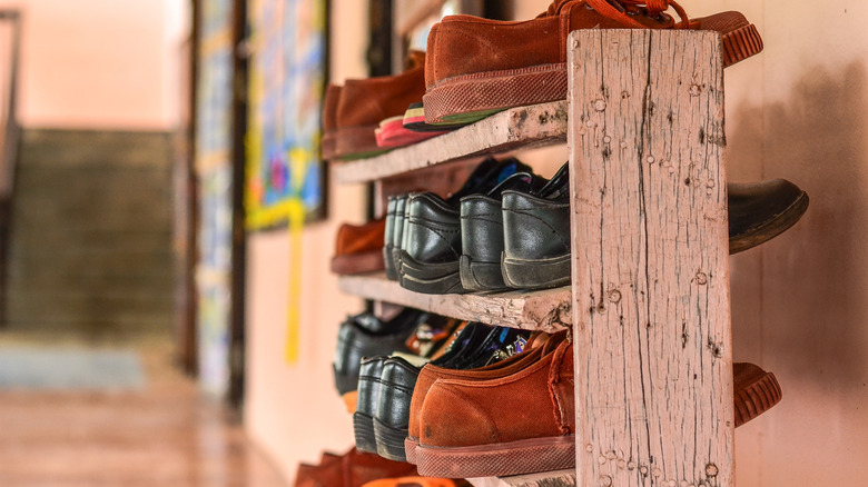 A shoe rack made from scrap wood
