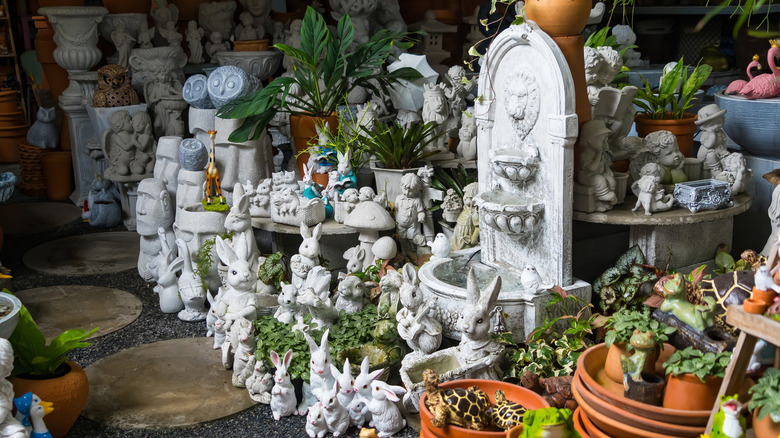 A large and eclectic display of garden décor in a shop
