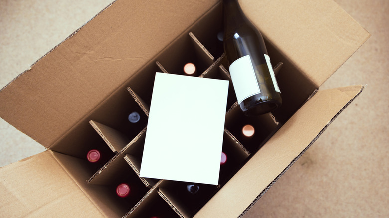 cardboard box of wine bottles