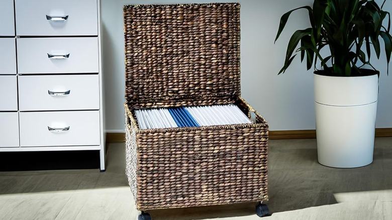 Open wicker filing basket in home office