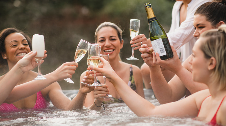 Toasting in hot tub