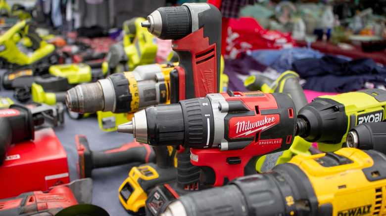 An array of tools including Milwaukee, Ryobi, and DeWalt