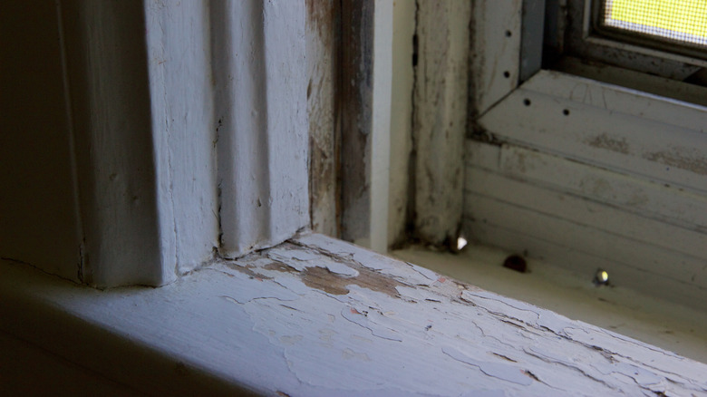 paint-chipped windowsill