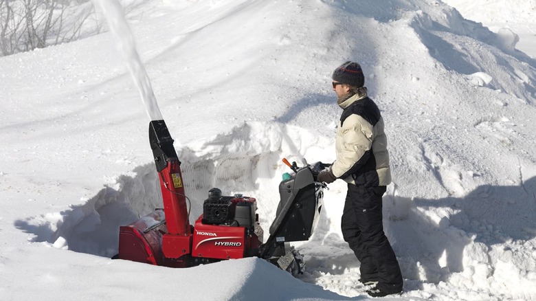Person using a large Honda snow blower