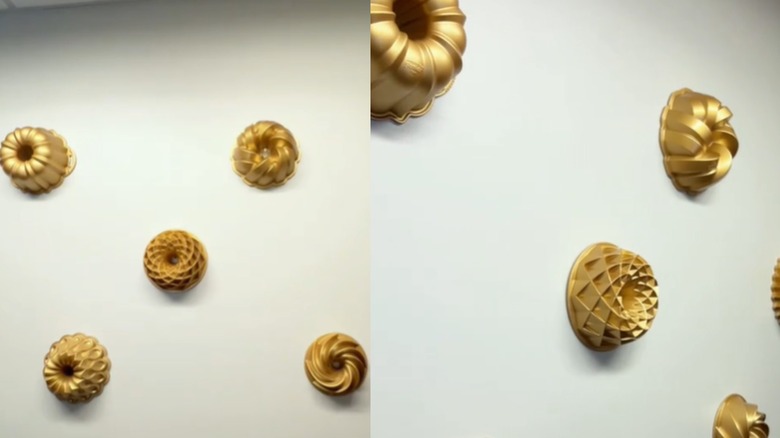 Bundt pans hanging on a wall