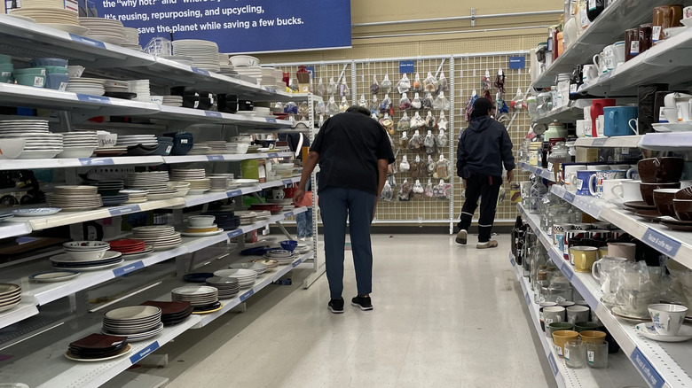 People shopping housewares at the thrift store