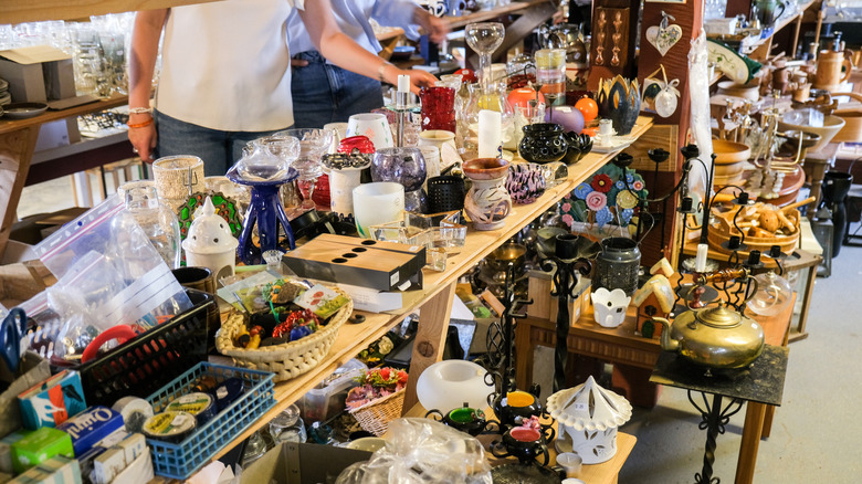 Person shopping for decor at a thrift store