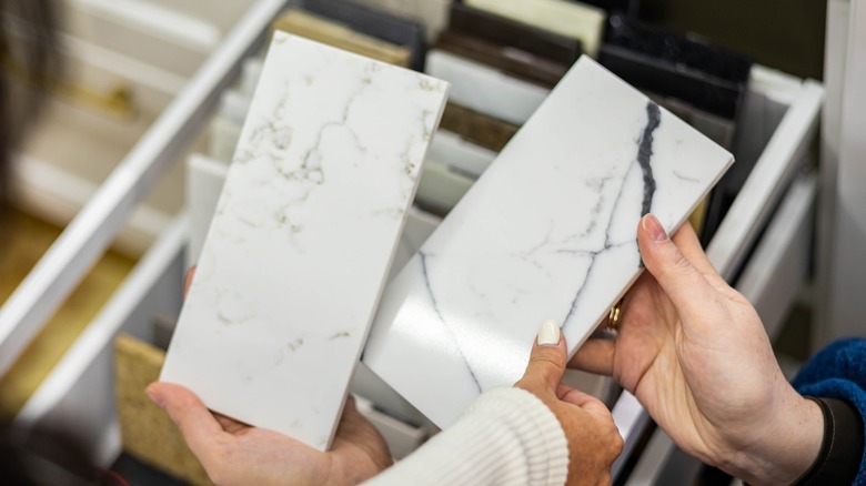 holding marble countertop samples 