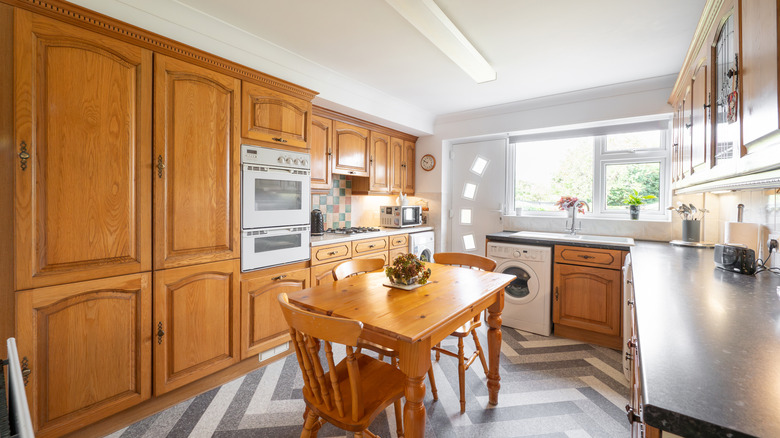 Honey oak kitchen cabinets in small kitchen