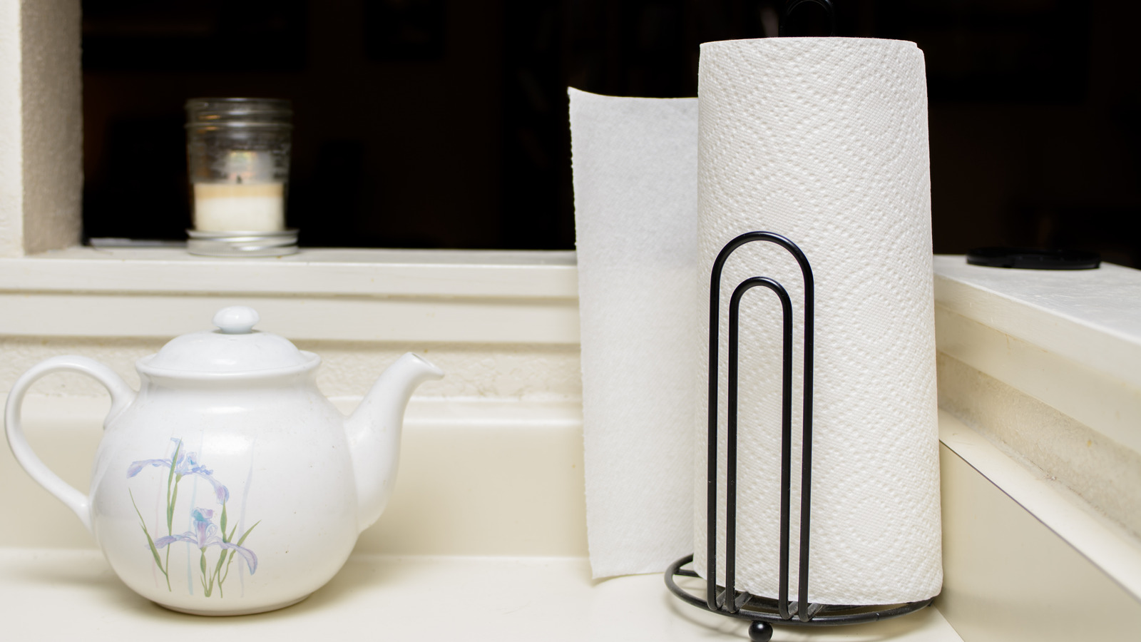 Aha! Hack: Tension Rod as Paper Towel Holder - The Organized Home