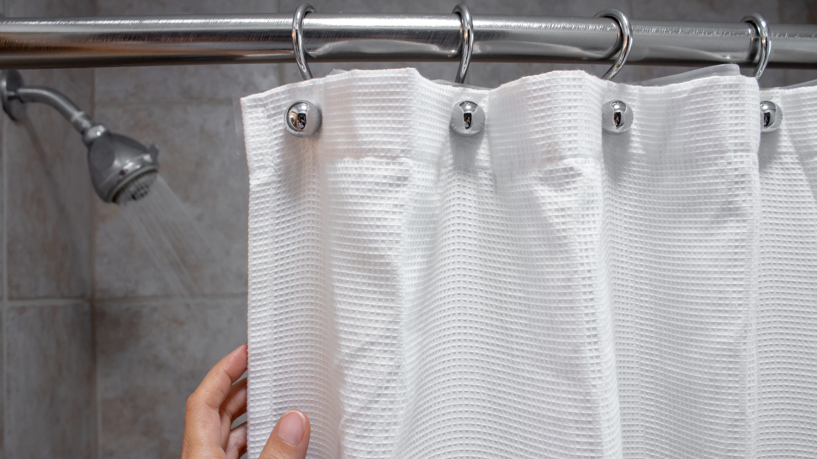 The TikTok Shower Curtain Hack That Will Make Your Bathroom Feel More
