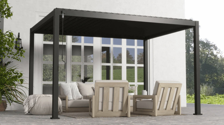 charcoal pergola with outdoor seating