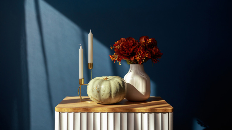 Table decorations with brass candle holders