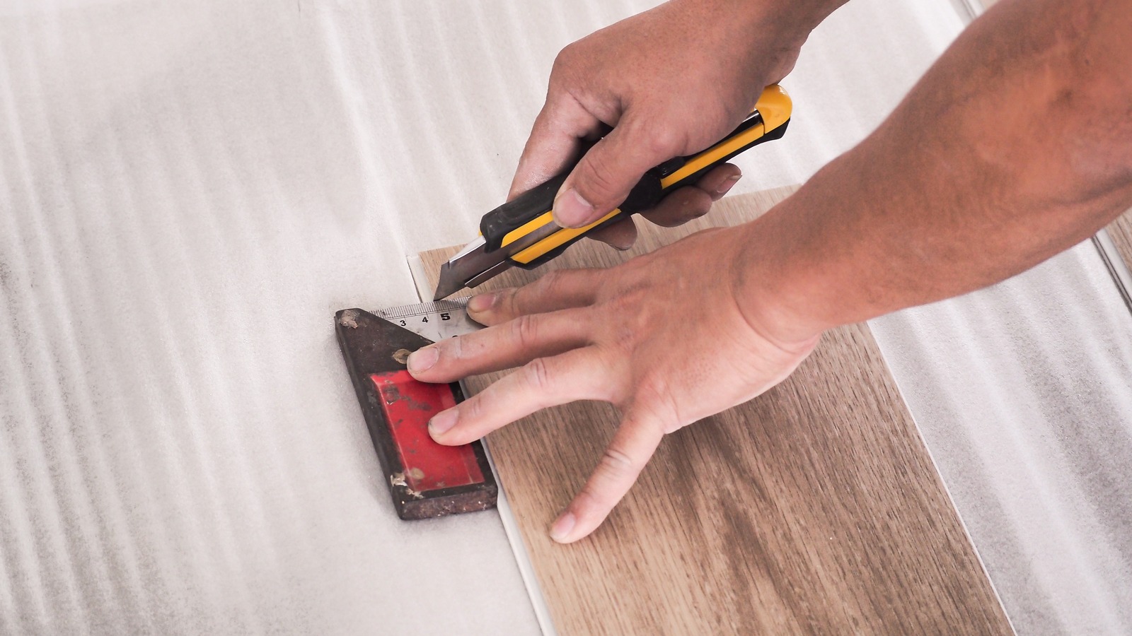 The Tips & Tools You Need To Cut Vinyl Plank Flooring