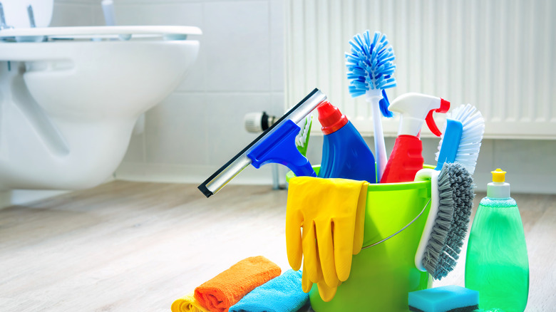 Cleaning supplies in a bathroom