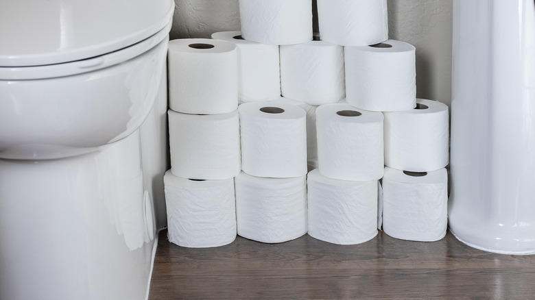 toilet paper rolls on floor