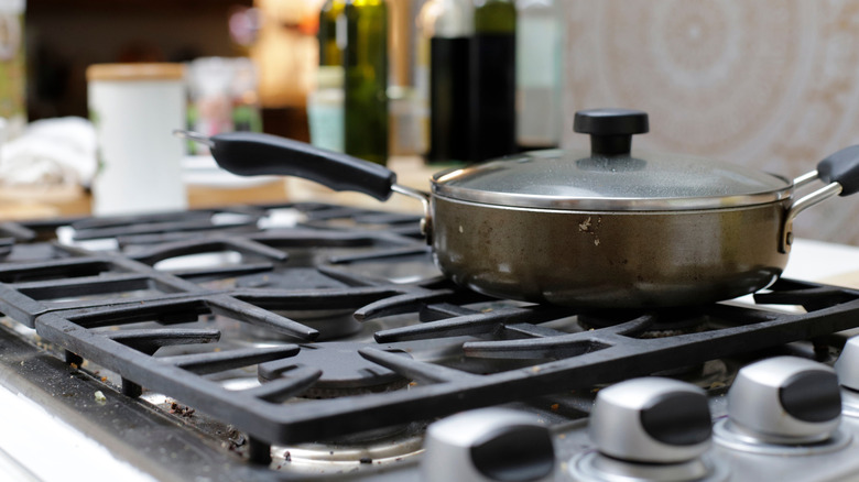 A stainless steel pan on a oven