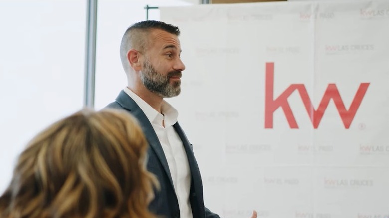 Agent giving presentation in Keller Williams real estate office