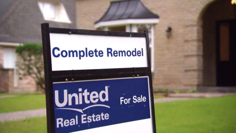 United Real Estate sign outside home for sale