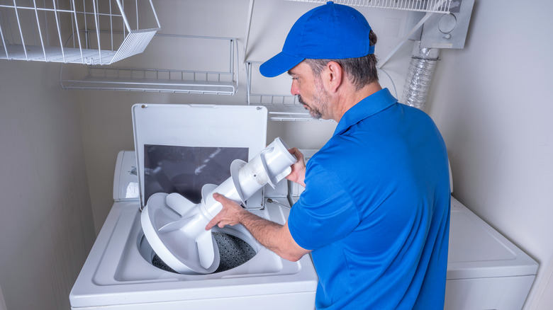 replacing agitator in washing machine