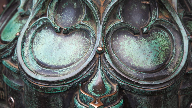 green patina on metal structure