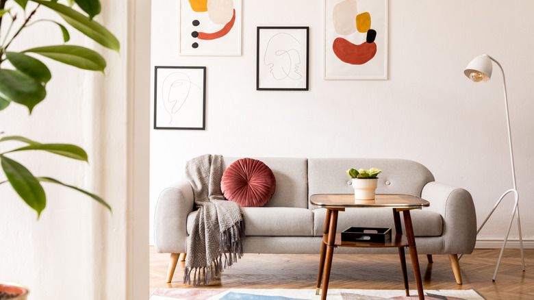 Lamp standing over sofa 