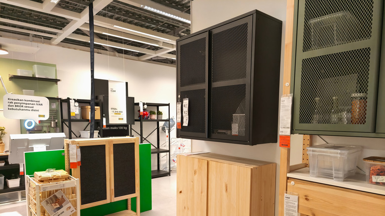 Various cabinets on display on IKEA store wall
