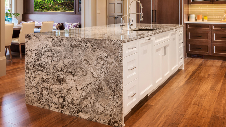 Bold black and white stone kitchen island.